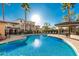 Relaxing community pool with lounge chairs and covered patio at 2821 S Skyline Dr # 165, Mesa, AZ 85212