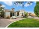 Landscaped backyard with grassy area and gravel pathway at 2856 E Cochise Rd, Phoenix, AZ 85028