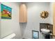 Small modern bathroom with updated sink and toilet at 2856 E Cochise Rd, Phoenix, AZ 85028