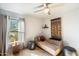 Serene bedroom with daybed and colorful wall hanging at 2856 E Cochise Rd, Phoenix, AZ 85028