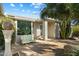 Landscaped front yard with a bench and desert plants at 2856 E Cochise Rd, Phoenix, AZ 85028