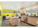Modern kitchen featuring light wood cabinets, a large island, and stainless steel appliances at 2856 E Cochise Rd, Phoenix, AZ 85028