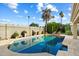 Refreshing pool and patio with lounge chairs and lush landscaping at 2856 E Cochise Rd, Phoenix, AZ 85028