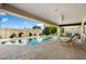 Inviting pool area with lounge chairs and covered patio at 2856 E Cochise Rd, Phoenix, AZ 85028