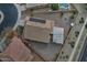 Aerial view of house, yard, and pool at 4648 S Emery --, Mesa, AZ 85212