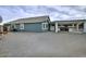 Spacious backyard with covered patio, grill, and gravel landscaping at 4648 S Emery --, Mesa, AZ 85212
