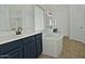 Bathroom with double vanity, soaking tub, and tile flooring at 4648 S Emery --, Mesa, AZ 85212