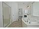 Bathroom features a walk-in shower, soaking tub, and double vanity at 4648 S Emery --, Mesa, AZ 85212