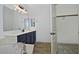 Bathroom with double vanity and walk-in closet at 4648 S Emery --, Mesa, AZ 85212