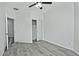 Bedroom with wood-look floors and a closet at 4648 S Emery --, Mesa, AZ 85212
