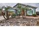 Front yard with palm trees and a rock garden at 4648 S Emery --, Mesa, AZ 85212