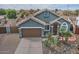 House front with two-car garage and desert landscaping at 4648 S Emery --, Mesa, AZ 85212