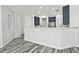 Kitchen with white quartz counters, dark cabinets, and stainless steel appliances at 4648 S Emery --, Mesa, AZ 85212