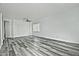 Living room with gray vinyl flooring and ceiling fan at 4648 S Emery --, Mesa, AZ 85212