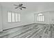 Living room with gray flooring, white walls, and sliding glass doors at 4648 S Emery --, Mesa, AZ 85212