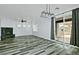 Spacious living area with fireplace and sliding glass doors at 4648 S Emery --, Mesa, AZ 85212