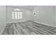 Bright living room with gray flooring and white walls at 4648 S Emery --, Mesa, AZ 85212