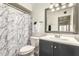 Clean bathroom, gray vanity, and a shower/tub combo at 5984 W Augusta Ave, Glendale, AZ 85301