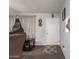 Home entryway with a brown couch and coffee table at 5984 W Augusta Ave, Glendale, AZ 85301
