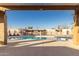 Community pool viewed from under a pergola at 5984 W Augusta Ave, Glendale, AZ 85301
