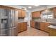 Bright kitchen with stainless steel appliances and oak cabinets at 6440 E Dallas St, Mesa, AZ 85205