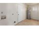 Laundry room with washer/dryer hookups and water heater at 7202 W Carol Ave, Peoria, AZ 85345