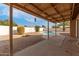 Inviting kidney-shaped pool with covered patio at 7202 W Carol Ave, Peoria, AZ 85345
