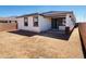 Backyard with a covered patio, perfect for outdoor relaxation and dining at 7802 E Quintana Ave, Mesa, AZ 85212