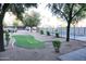 Community backyard with grassy area and pool at 7857 N 21St Ave, Phoenix, AZ 85021