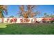 Landscaped backyard with a wall of bougainvillea at 8280 S Pecan Grove Cir, Tempe, AZ 85284