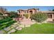 Brick house with landscaped yard and stone pathway at 8280 S Pecan Grove Cir, Tempe, AZ 85284