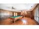 Game room features a pool table and hardwood floors at 8280 S Pecan Grove Cir, Tempe, AZ 85284