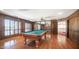 Game room with pool table and wood paneling at 8280 S Pecan Grove Cir, Tempe, AZ 85284