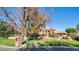 Two-story house with a landscaped lawn and mature trees at 8280 S Pecan Grove Cir, Tempe, AZ 85284