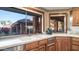 Kitchen features a large window overlooking the backyard at 8280 S Pecan Grove Cir, Tempe, AZ 85284