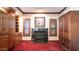 Cozy library with built-in bookshelves and a fireplace at 8280 S Pecan Grove Cir, Tempe, AZ 85284
