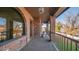 Brick patio with arched windows and backyard access at 8280 S Pecan Grove Cir, Tempe, AZ 85284