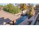 Inviting swimming pool with brick decking and covered patio at 8280 S Pecan Grove Cir, Tempe, AZ 85284