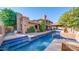 Expansive pool and spa area, with brick accents and a large backyard at 8280 S Pecan Grove Cir, Tempe, AZ 85284