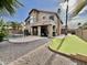 Spacious backyard with pool, patio, putting green at 938 W Iris Dr, Gilbert, AZ 85233