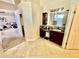Bathroom with double vanity and granite countertops at 938 W Iris Dr, Gilbert, AZ 85233