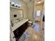 Bathroom with single vanity, toilet and shower at 938 W Iris Dr, Gilbert, AZ 85233