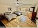 Spacious bedroom with hardwood floors and large window at 938 W Iris Dr, Gilbert, AZ 85233