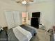 Bedroom with double bed, dresser, and closet at 938 W Iris Dr, Gilbert, AZ 85233