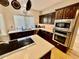 Modern kitchen features stainless steel appliances and a large island at 938 W Iris Dr, Gilbert, AZ 85233