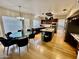 Eat-in kitchen with island, stainless steel appliances, and dark wood cabinets at 938 W Iris Dr, Gilbert, AZ 85233