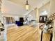 High ceiling living room with hardwood floors and fireplace at 938 W Iris Dr, Gilbert, AZ 85233