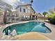 Stunning kidney-shaped pool with fenced backyard at 938 W Iris Dr, Gilbert, AZ 85233