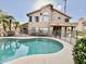 Lovely pool with large backyard and home view at 938 W Iris Dr, Gilbert, AZ 85233