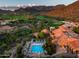 Aerial view of property with pool and mountain backdrop at 10163 E Hualapai Dr # 2917, Scottsdale, AZ 85255